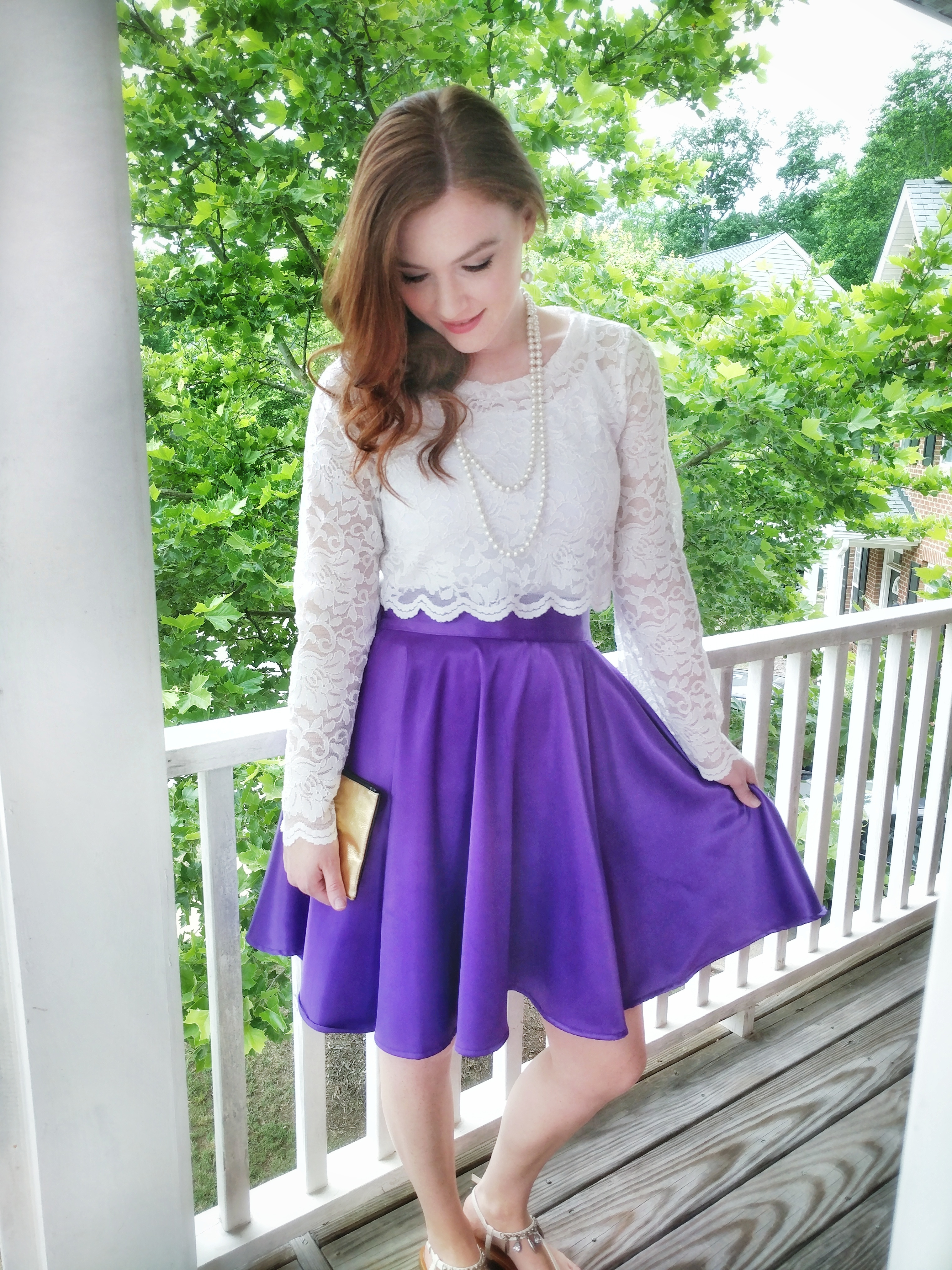 Purple skirt paired with a lace crop top