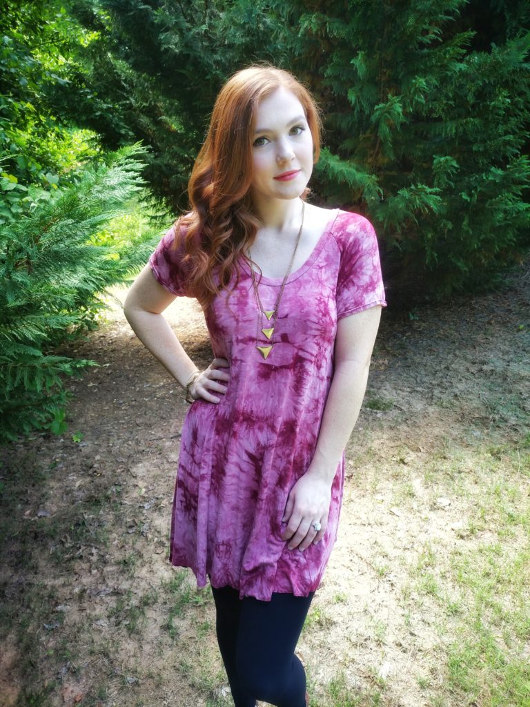 red and pink tie dye tunic with black leggings on girl