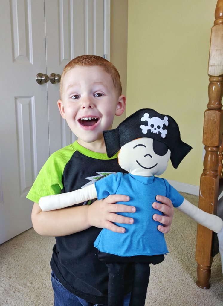 Little boy with stuffed pirate