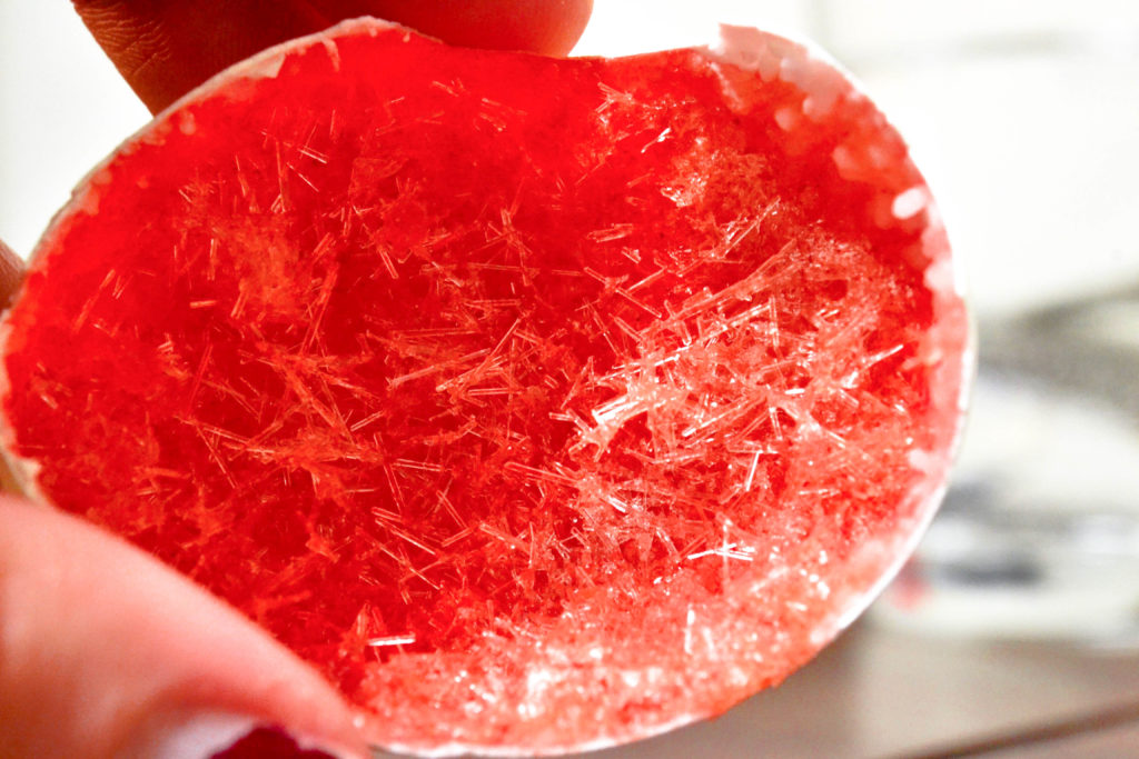 Red crystal geode made with epsom salt in an eggshell