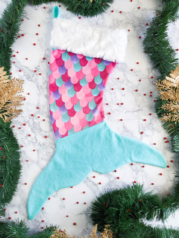 Mermaid tail stocking made from fleece and faux fur.