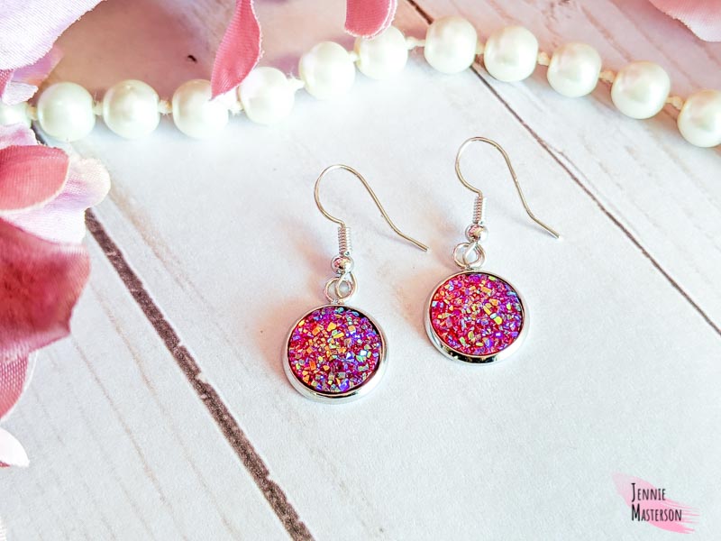 Pair of pink druzy stone earrings.