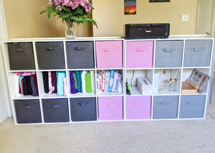 craft room organization with cube shelving.
