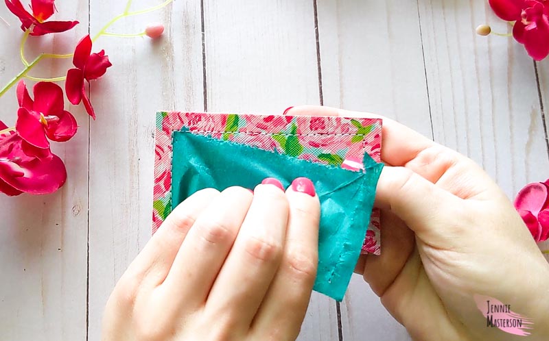 Taking the Tissue paper off of the card wallet.