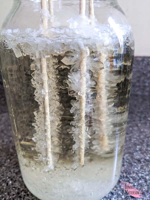 Rock candy growing in the mason jar.