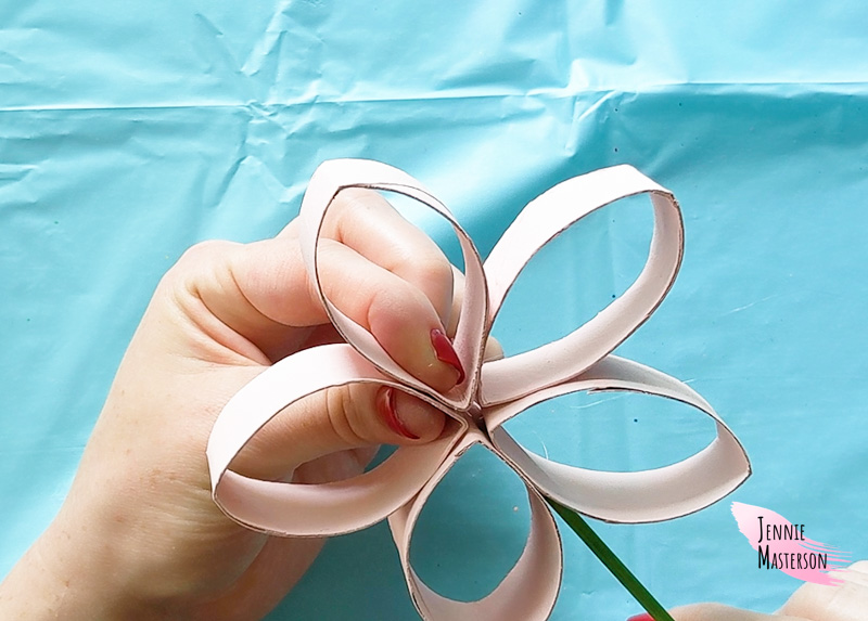 Glueing the petals closer together in the center.