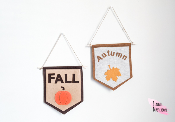 Two fall signs made from felt.