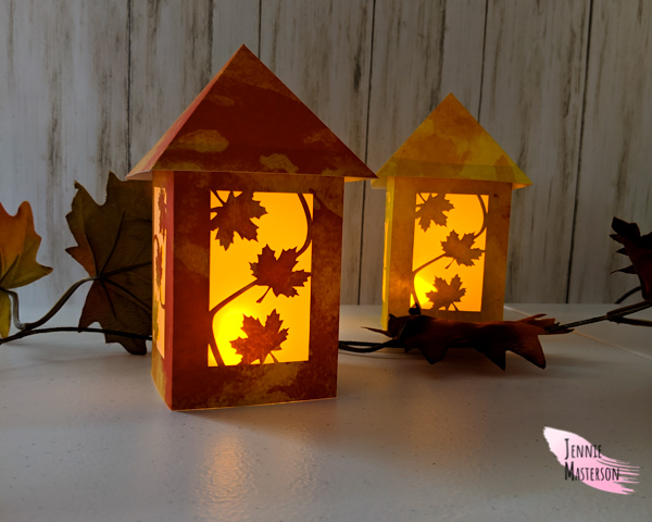 fall leaf lanterns illuminated.