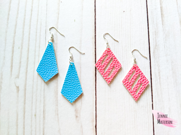 Two pairs of faux leather earrings, one blue, one pink.